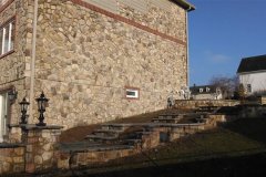 Landesign-Hardscape-Masonry-Valley-Forge-Same-stone-house-with-stone-walls-steps-columns-and-entrance-to-the-patio