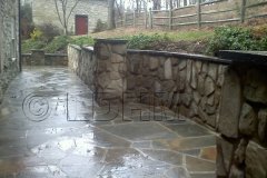 Landesign-Hardscape-Masonry-Valley-Forge-Flagstone-Patio-with-a-stone-staircase-and-stone-seating-wall-1