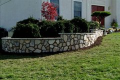 Landesign-Hardscape-Masonry-Valley-Forge-Step–down-stone-wall-and-planter