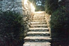 Landesign-Hardscape-Masonry-Valley-Forge-stone-wall-steps-with-light