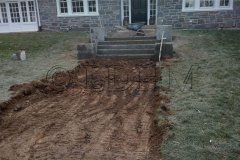 Landesign-Hardscape-Masonry-Valley-Forge-During-Flagstone-walk-in-concrete-with-steps-and-columns-bordered-on-Belgian-Block.-Haverford-PA