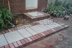 Landesign-Hardscape-Masonry-Valley-Forge-Flagstone-walk-bordered-with-red-brick